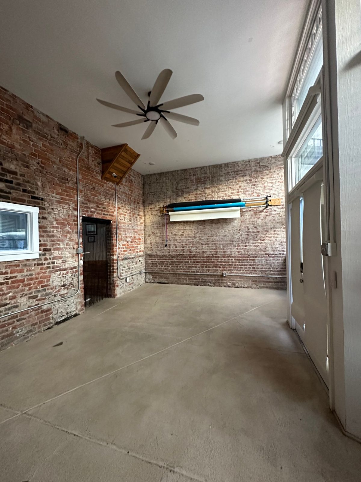 The whole floor clear, facing the backdrop wall