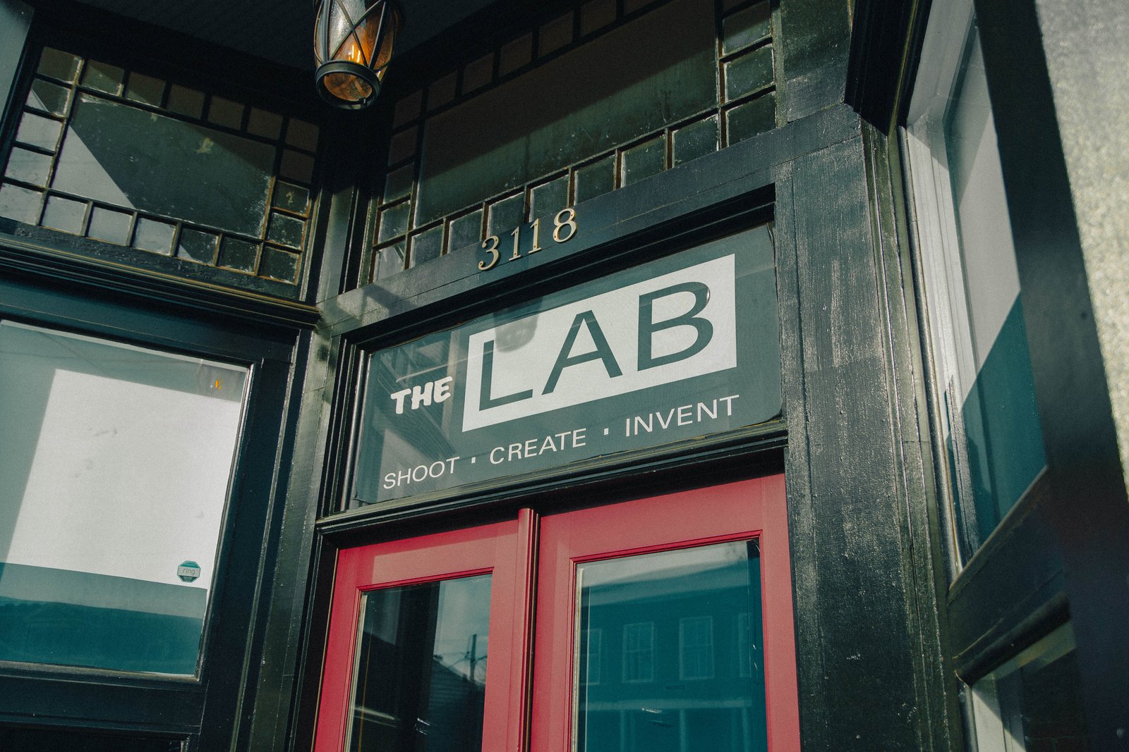 Look for The Lab sign over the red doors
