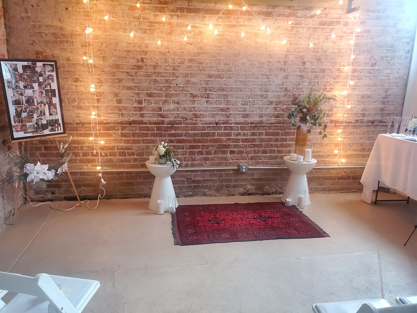 String lights on brick, set for a ceremony