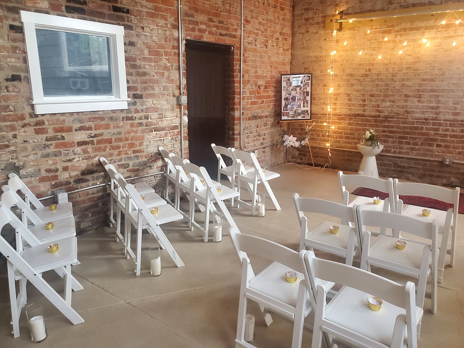 Rows of white chairs from the back of the room