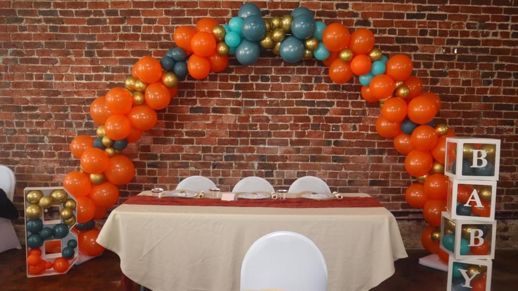 Balloon arch against the brick